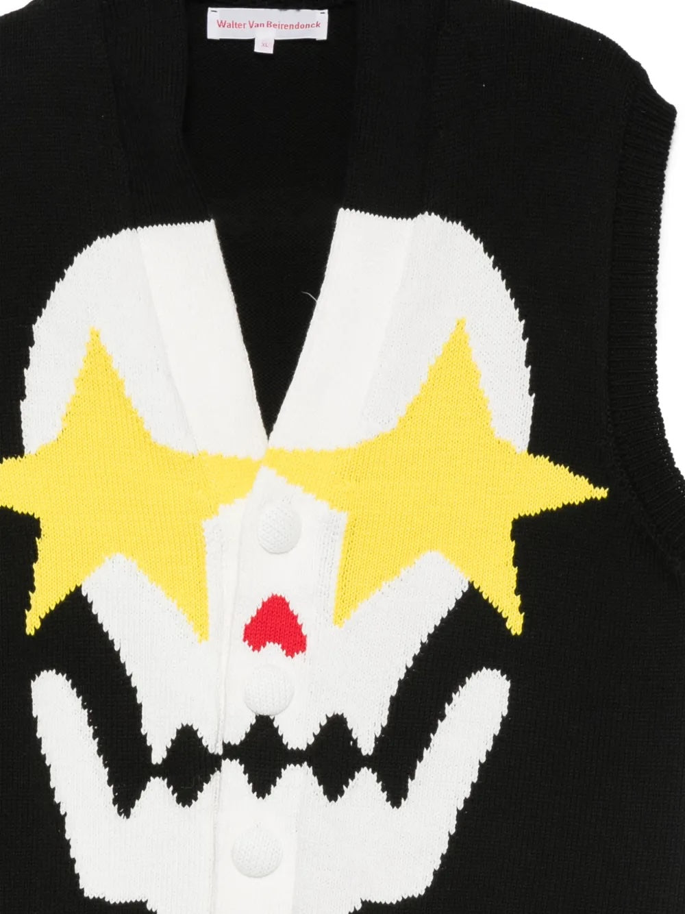 Walter Van Beirendonck Starry Eyes Vest in black, close-up of intarsia skull knit with yellow star eyes, red heart nose and button fastening detail