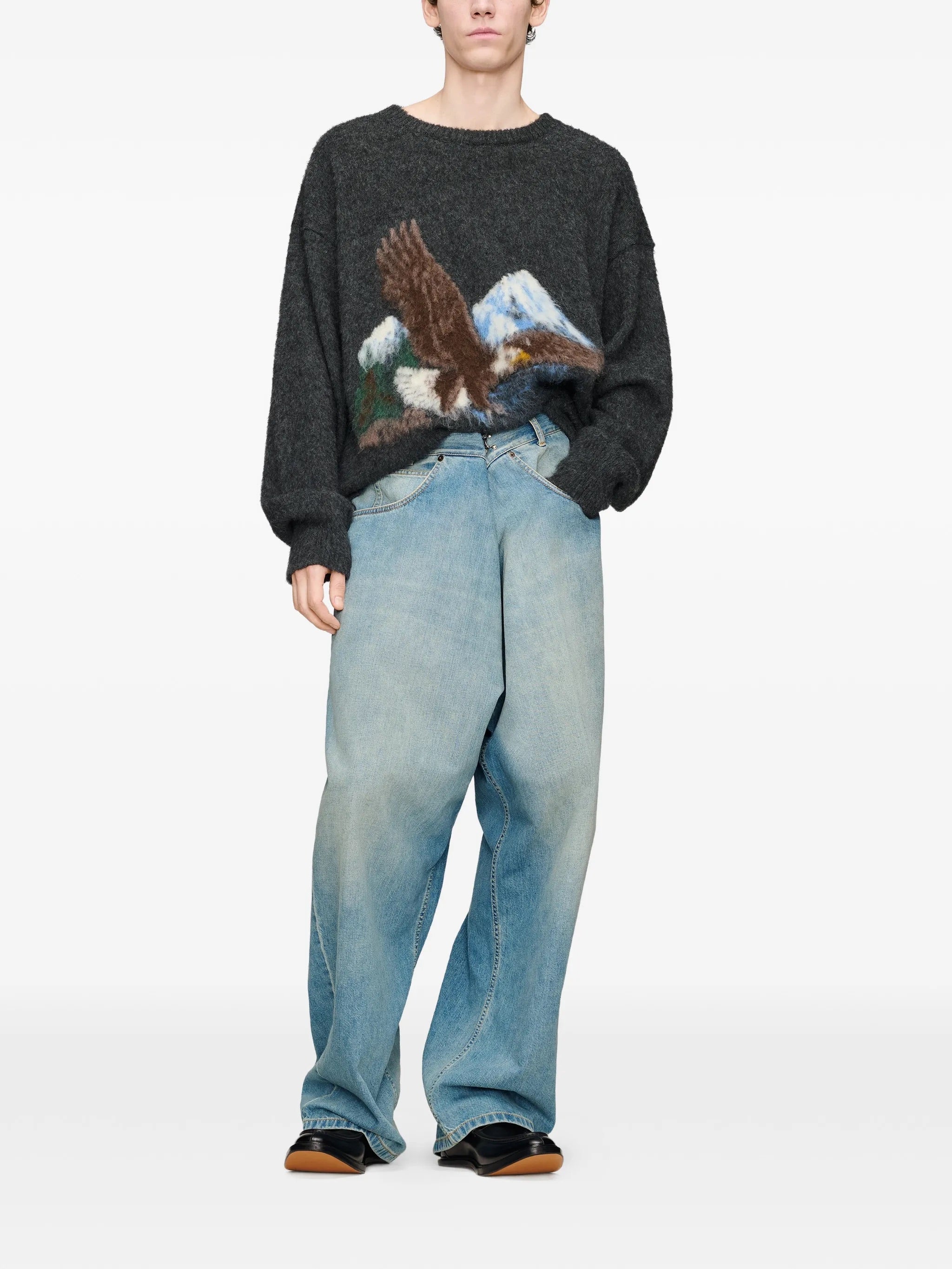 Model wearing Maison Margiela Wrap Denim Trousers in Old Blue