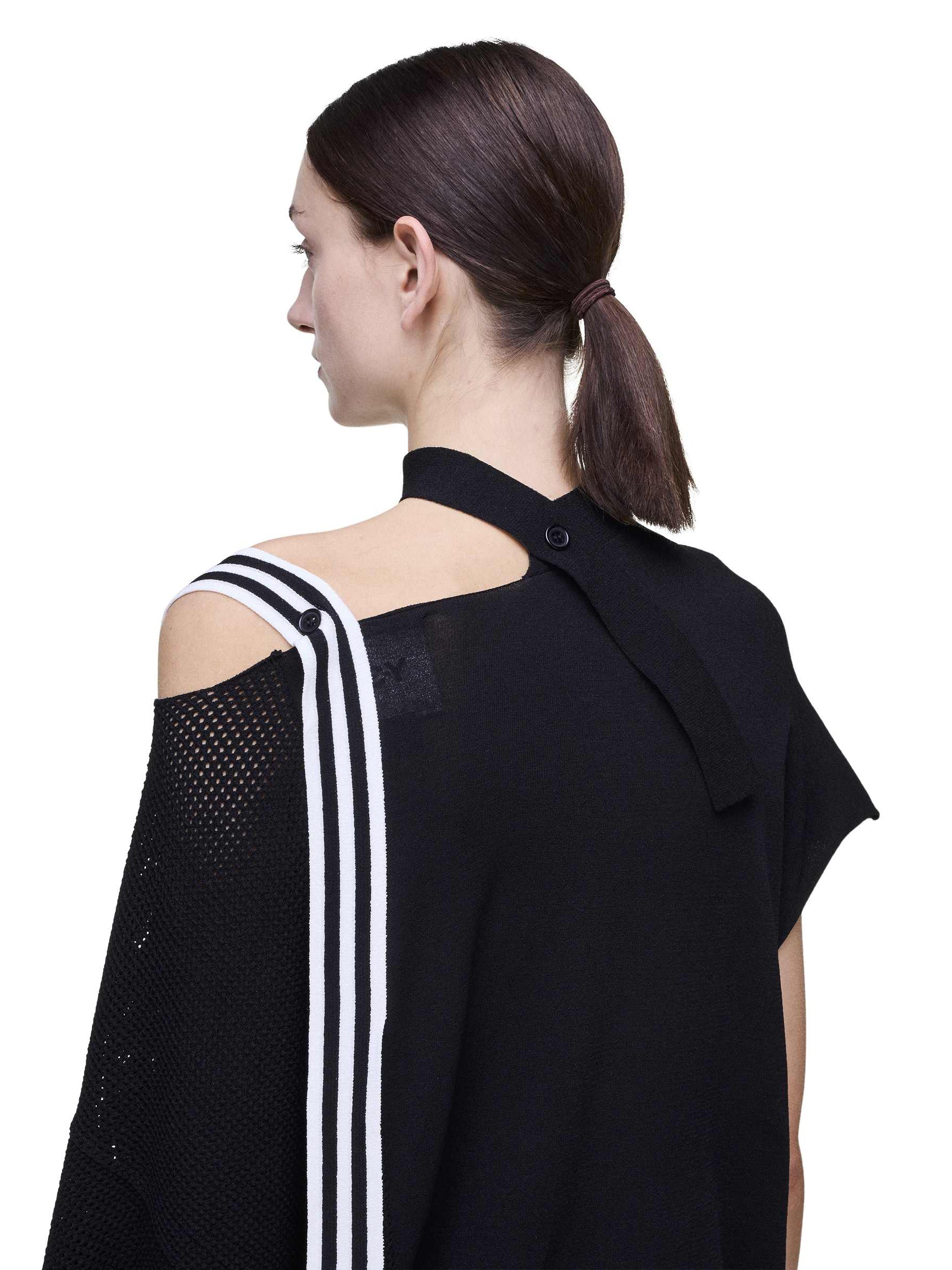 Back close-up of a female model wearing the Y-3 Knit Top in Black, showing the refined knit surface and fabric detailing.