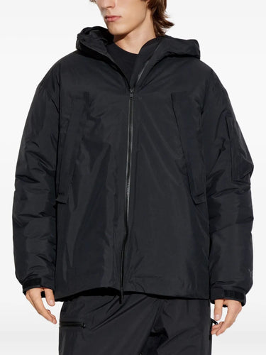 Person wearing Y-3's gote-tex jacket in black