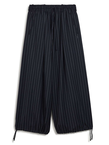 Front packshot of the Y-3 Raw-Cut Wool Pants in Black, showing the cropped wide-leg silhouette, oversized fit, and raw-cut detailing.