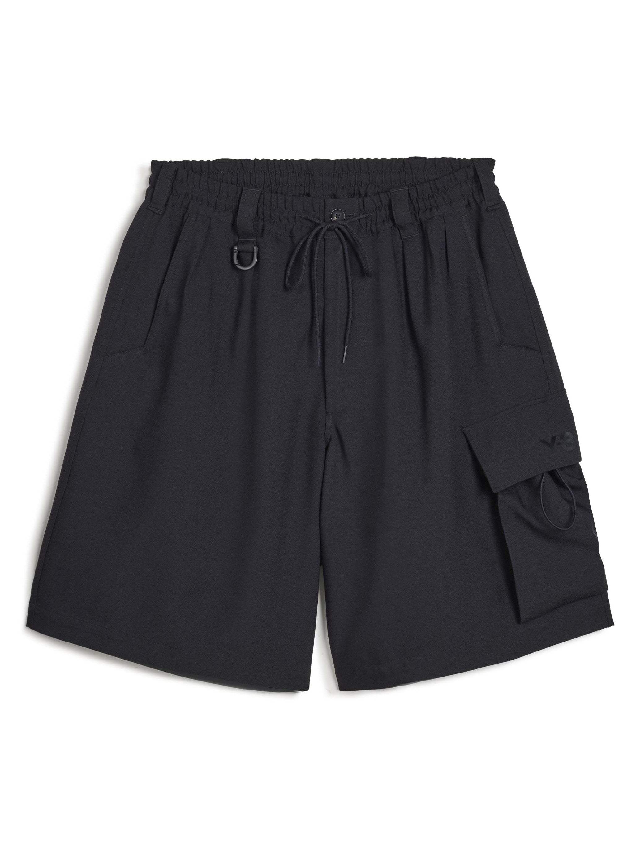 Front packshot of the Y-3 Sport Uniform Cargo Shorts in Black, showing the oversized relaxed fit, twill construction, and utilitarian design.