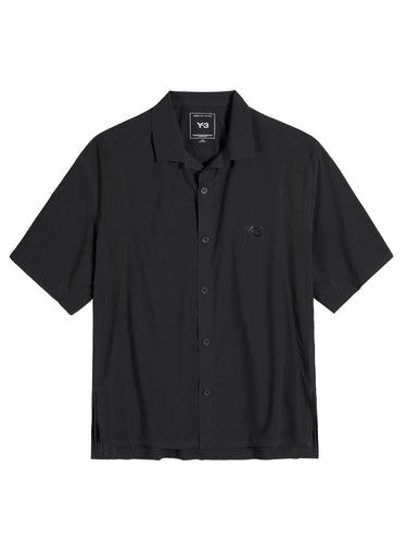 Front packshot of the Y-3 Ultralight Woven Shirt in Black, showing the lightweight stretch woven fabric, short sleeves, asymmetrical bonded slits for ventilation, centre-front button closure, and tonal Y-3 logo.