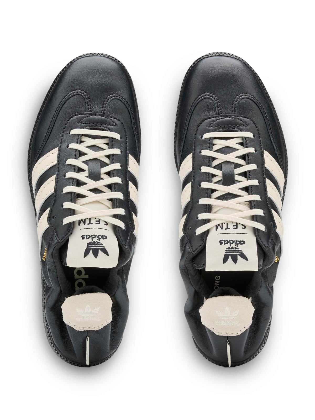 adidas x Song for the Mute ADI008 Samba OG SFTM sneakers, top view showing cream laces and co-branded tongue labels.