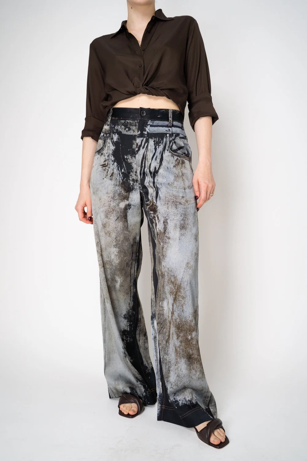 Annette Görtz printed denim trousers worn with dark brown shirt, front view on model