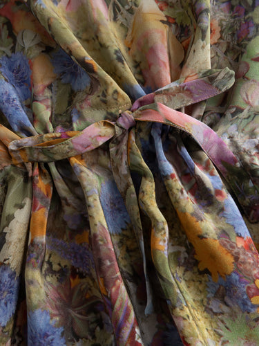 Simple Dress in Print G by Anntian, closeup of self-tie waist bow in matching floral organic silk, gathering fluid fabric at centre front, Spring/Summer 2026