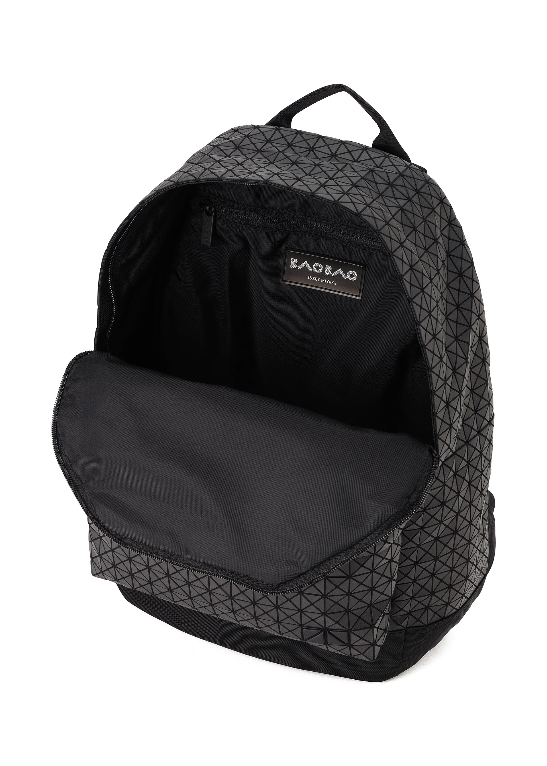 Bao Bao Issey Miyake Kuro Daypack in matte black shown open with spacious main compartment, zip closure and inner branded lining