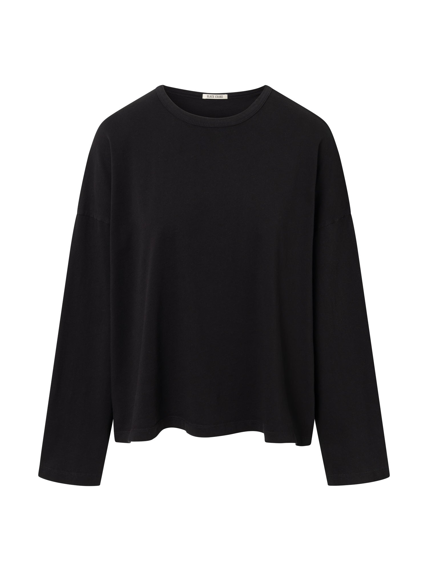 Front view of the Black Crane Loose Longsleeve Tee in black, featuring a round neck, long sleeves, regular fit, and straight hem.