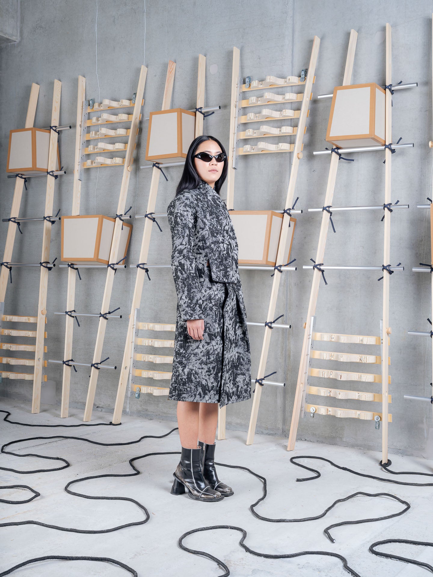 Model wearing Henrik Vibskov Carry Skirt in Black 3D White side view
