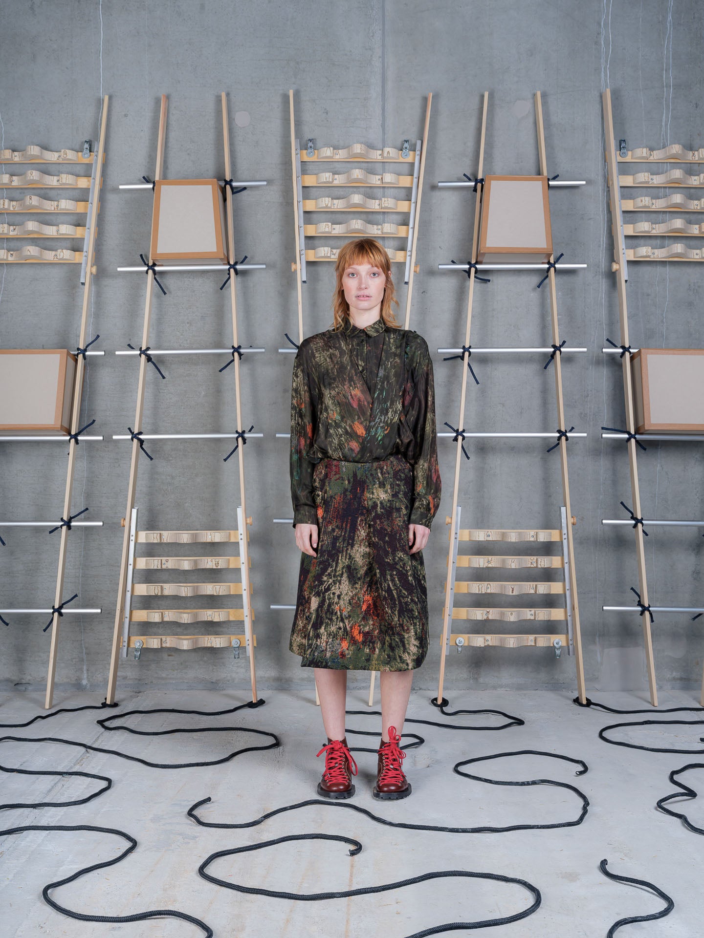 Model wearing Henrik Vibskov Carry Skirt in Gobelin Swamp front view
