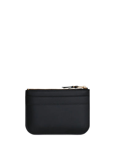 Black leather pouch with a gold zipper on a white background