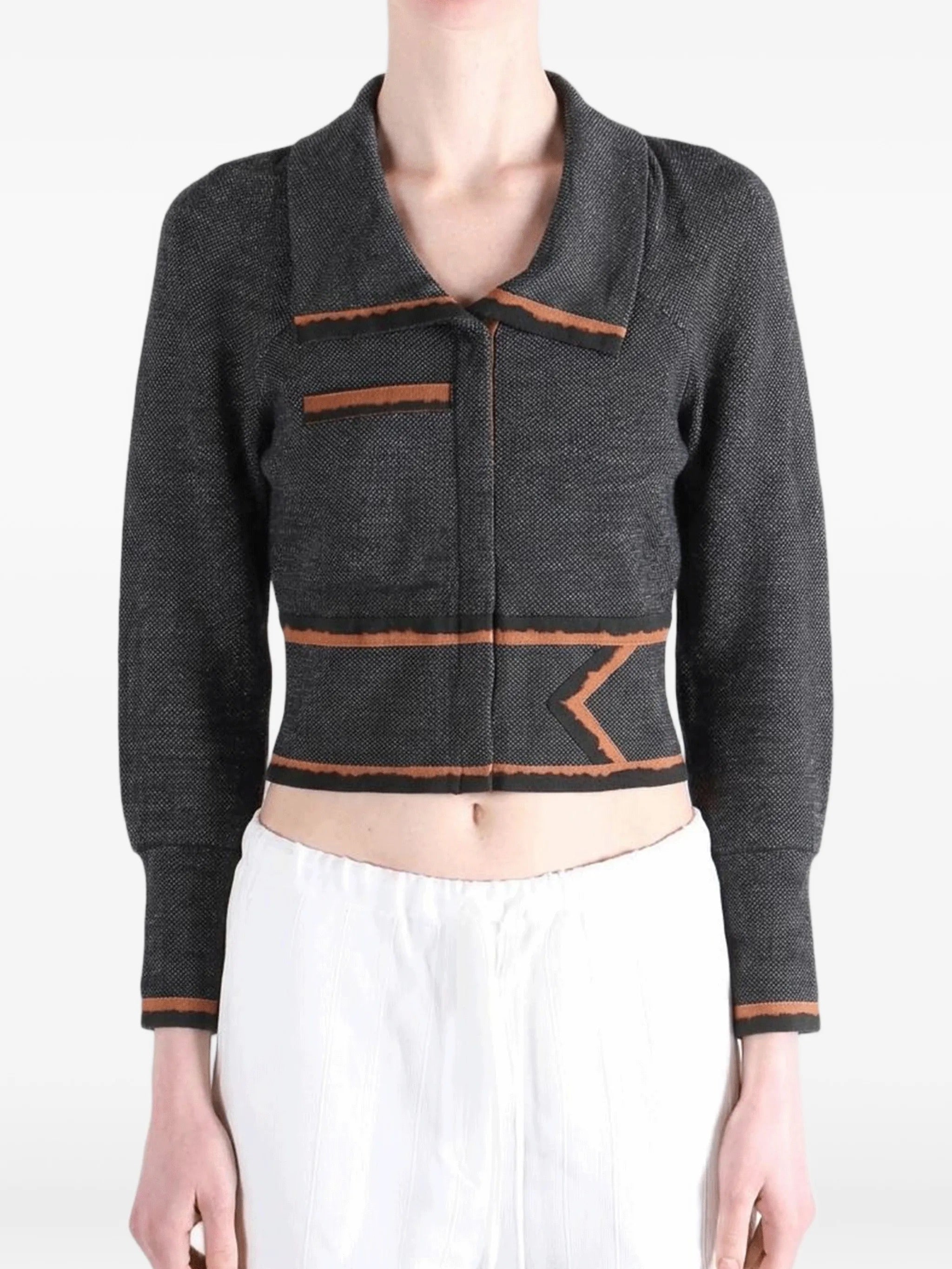 Model wearing the Kiko Kostadinov Compass Jacket in Abyss Black from the front.
