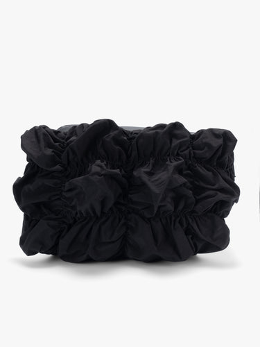 Côte&Ciel Neva Gathered crossbody bag in black, front angled view highlighting sculptural gathered nylon and compact storage compartments.