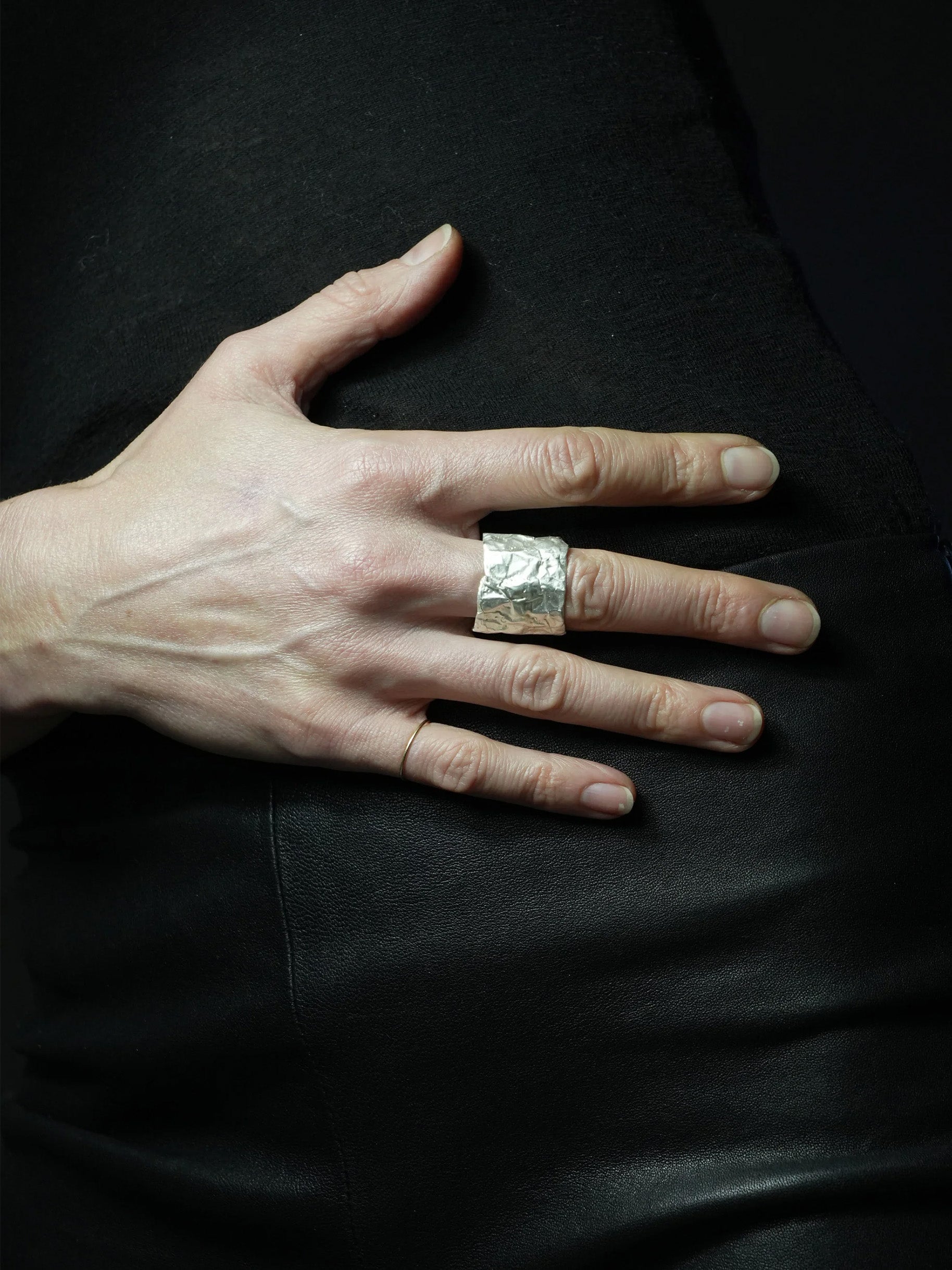 Saskia Diez wide statement ring with folded surface detail in silver finish