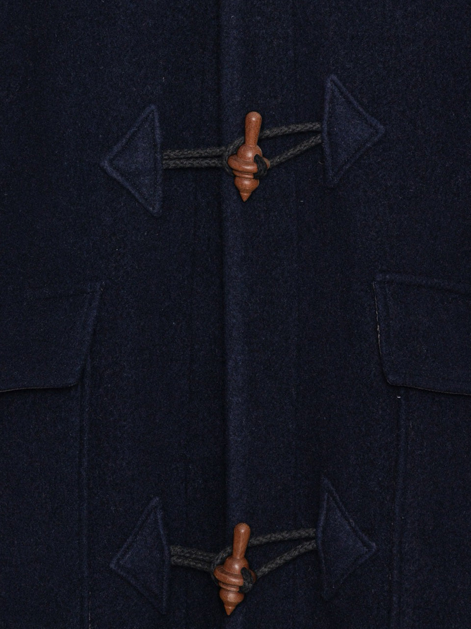 Henrik Vibskov Duffle Coat in Navy Duffle toggle fastening detail
