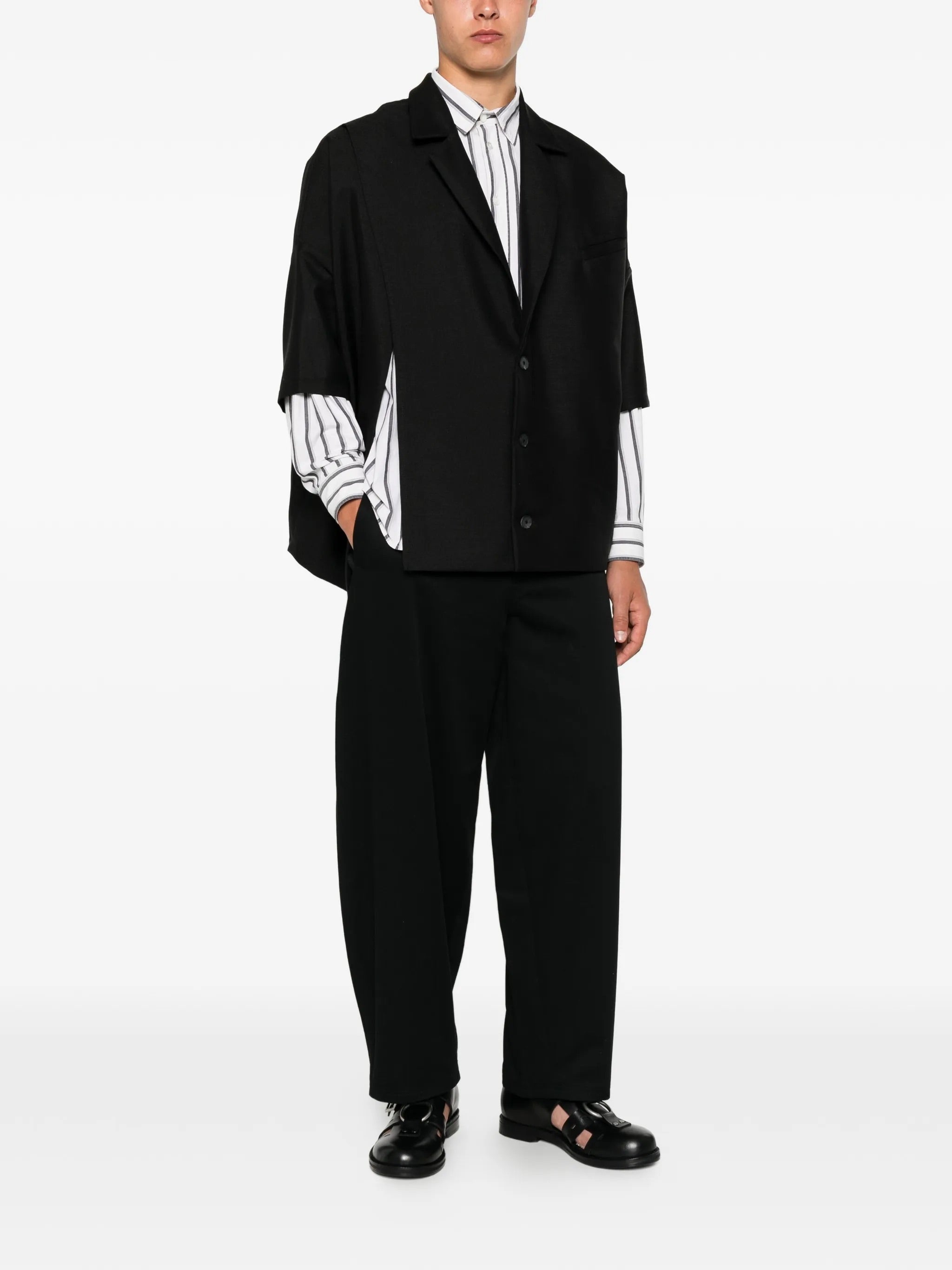 House Of The Very Islands Esra Shirt in Black - full length front view on model showing oversized fit and notch lapel detail