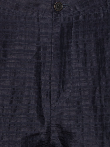 Close-up shot of the Artist Pants in navy from Henrik Vibskov Spring/Summer 2026 Studio Collection, showing the front button and zipper closure, waistband stitching, and pocket detailing.