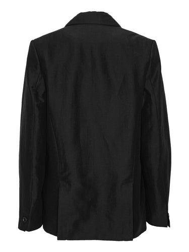 Back view of the Beetle Blazer showing the clean silhouette and layered structure.
