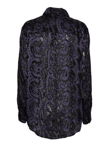 Back view of the Block Shirt showing the loose silhouette and curved hem in semi-transparent dark purple fabric.
