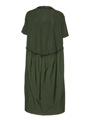 Back view of the Bon Chalant Dress showing the oversized silhouette and textured ruched construction.