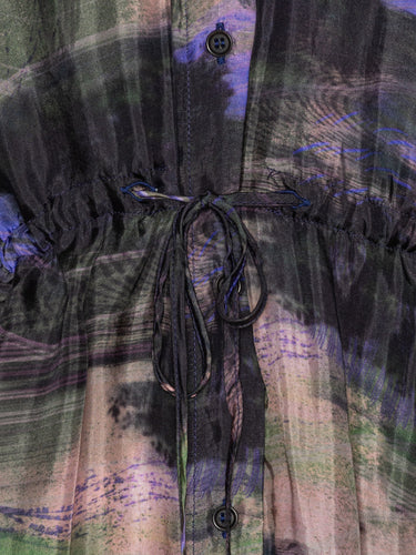 Close-up of the Henrik Vibskov Flat Dress in Foxes, highlighting the abstract foxes and nature print, buttons, and fabric texture.