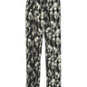 Front view of full plissé pants with a black, grey, and white abstract bursting-eggs pattern.