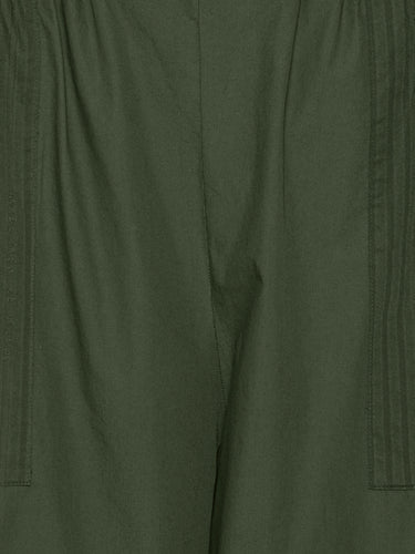 Close-up of fabric texture and elastic waistband on the Helmet Pants in Garden Green navy green wide-leg pants – Henrik Vibskov Spring/Summer 2026 Key Collection