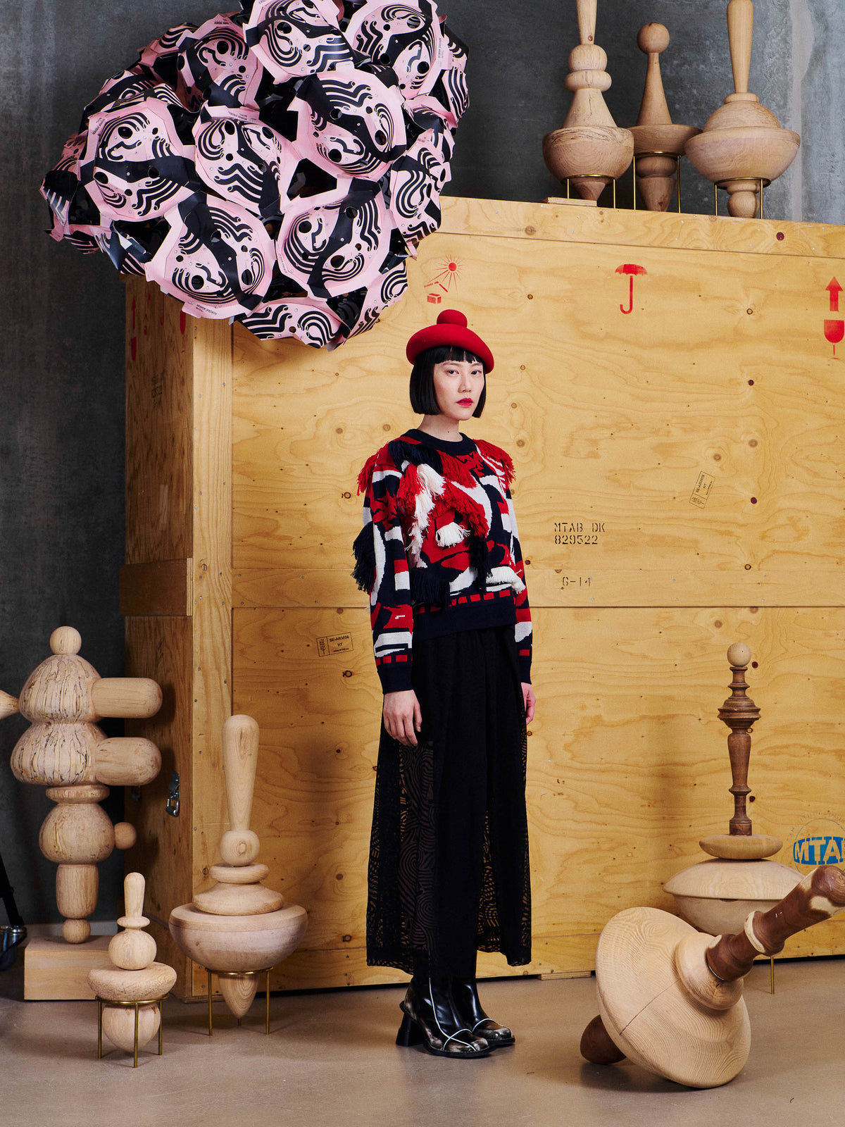 Side view of Henrik Vibskov Knit Ham Onion Sweat showing textured fringe details, graphic jacquard pattern and cropped wool silhouette