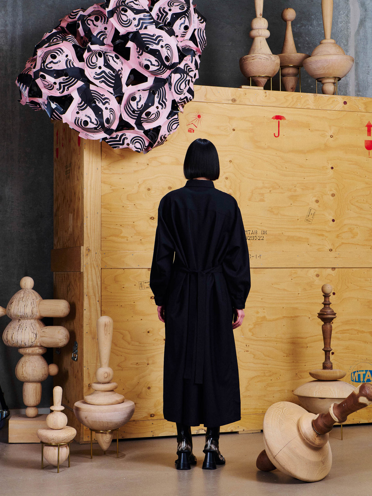 Henrik Vibskov Love You Dress in Black worn back view, showing the relaxed fit, gathered waist tie and long straight silhouette.