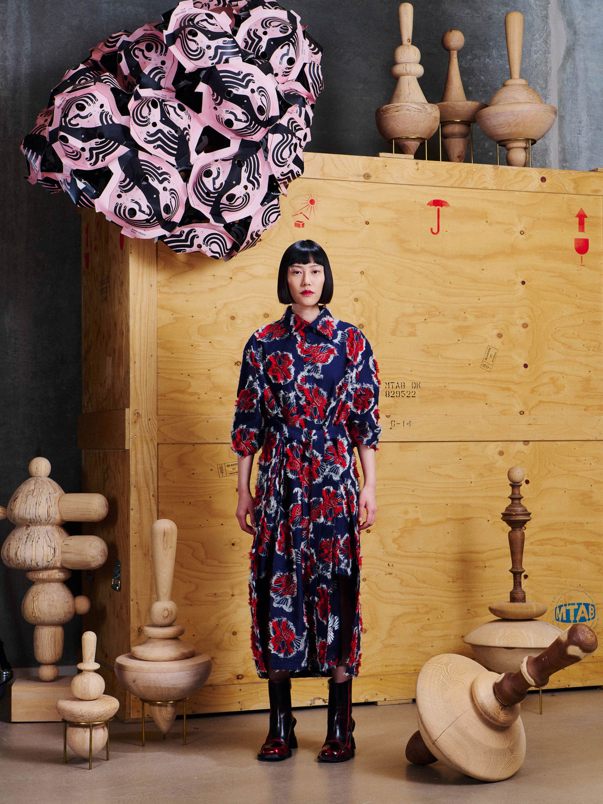 Henrik Vibskov Love You Dress in Red Navy Birdy styled on model from the front, showing the button front, waist tie and raised bird jacquard texture. ID: ARCHIVE-F302