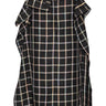 Front view of the Henrik Vibskov Ocu Skirt in Black Checks, showing the black check pattern, extra fabric design, side pockets, side slit, and straight hem.