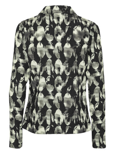 Back view of the Henrik Vibskov Plissé Blazer in Bursting Eggs, showing the fitted shape, full plissé finish, and black, grey, and off-white abstract print.