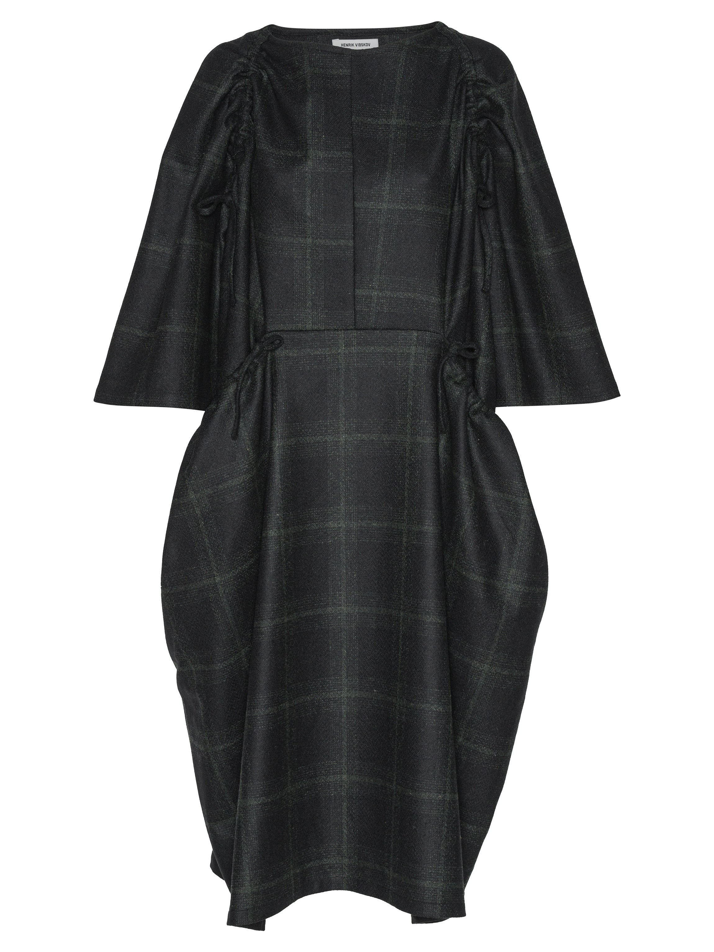 Black checkered dress with puff sleeves on a white background