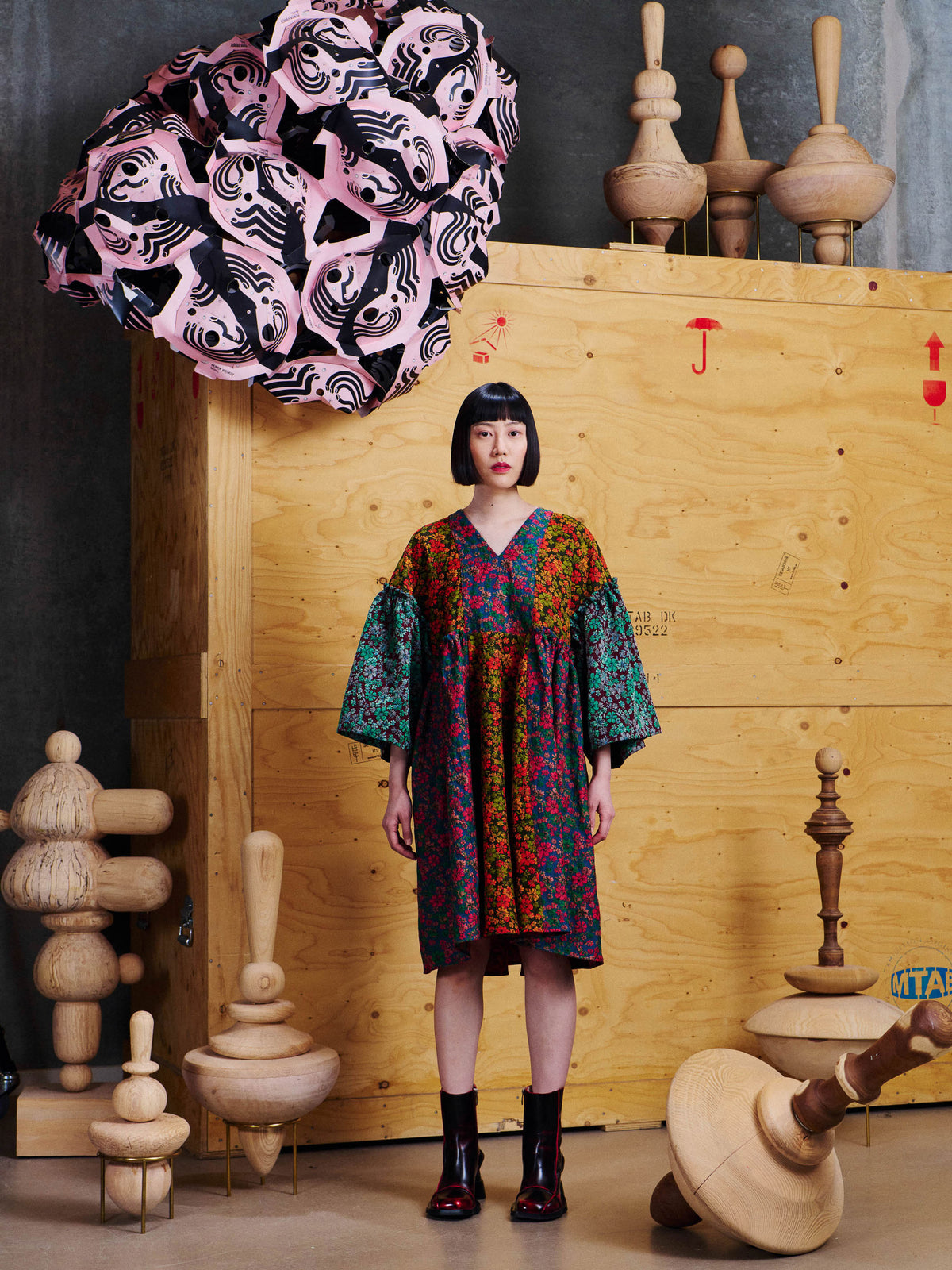 Model wearing the Henrik Vibskov Pumpkin Dress in Floral Affairs from the front, showing the relaxed knee-length silhouette and mixed floral pattern.