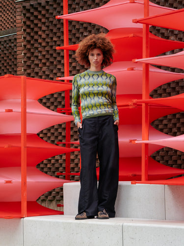 Model wearing the Resonance Longsleeve in Multi Flame green and silver patterned long sleeve top with snug round neck and form-fitting silhouette, front view – Henrik Vibskov Spring/Summer 2026 Key Collection