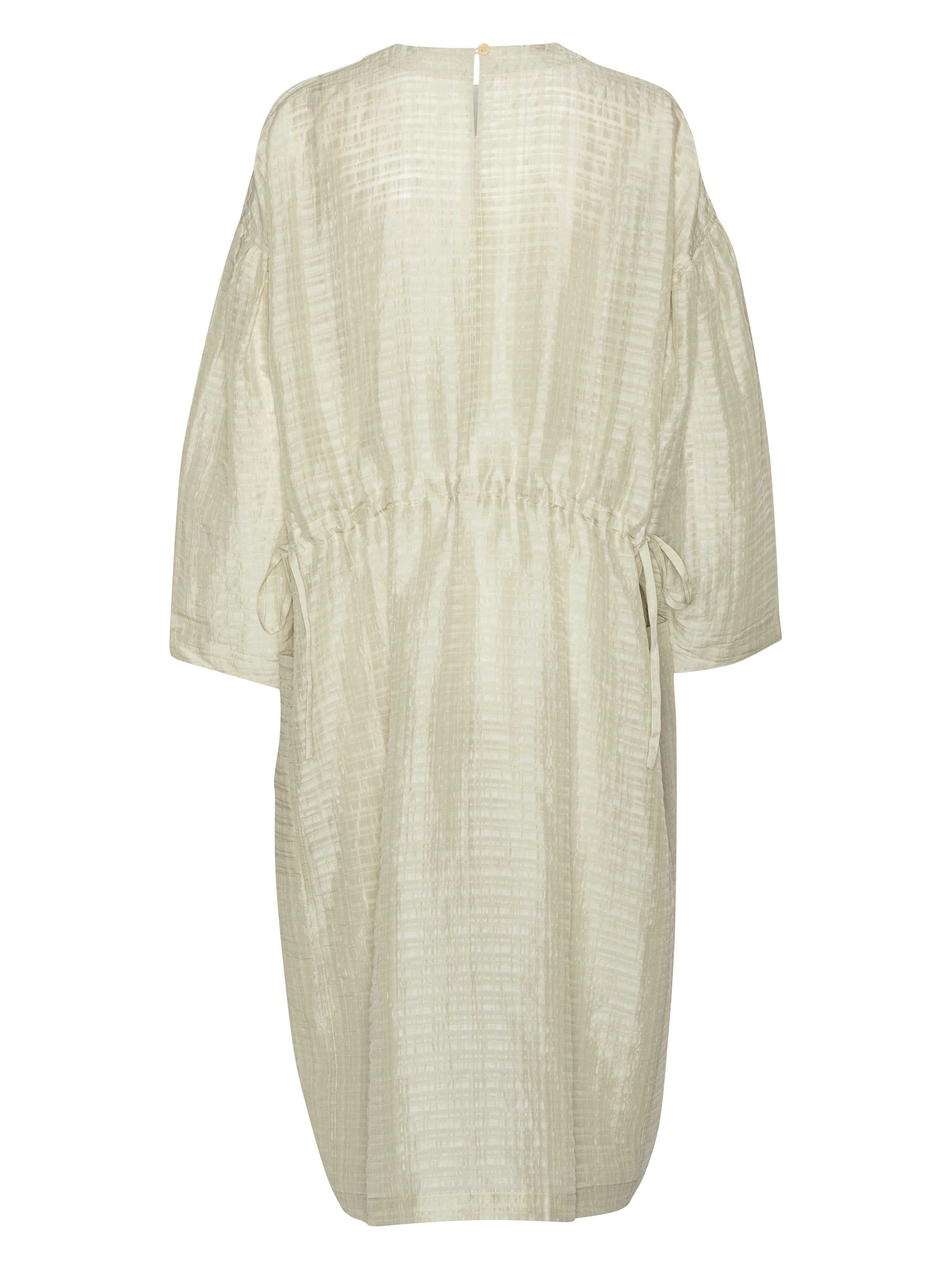 Back view of the beige-grey dress with long sleeves from Henrik Vibskov on a white background