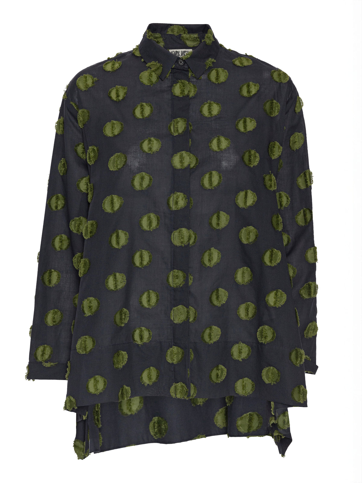 Henrik Vibskov Wind In Blouse in Black Green Dots shown from the front, featuring textured green dots, a pointed collar, long sleeves and a high-low hem.