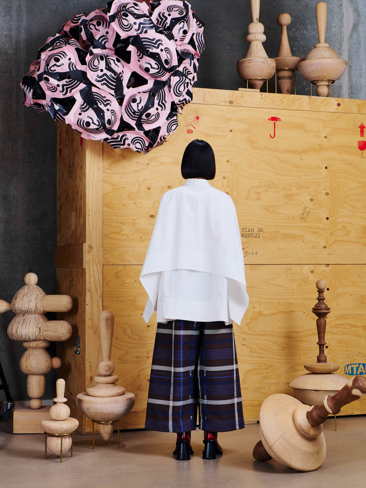 Henrik Vibskov Wind In Blouse in White worn back view, showing the layered cape-like back panel and asymmetric hem.