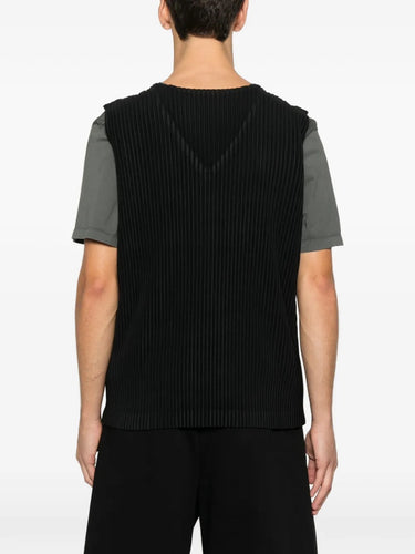 Back view of the black plissé vest from Homme Plissé Issey Miyake on a white background.