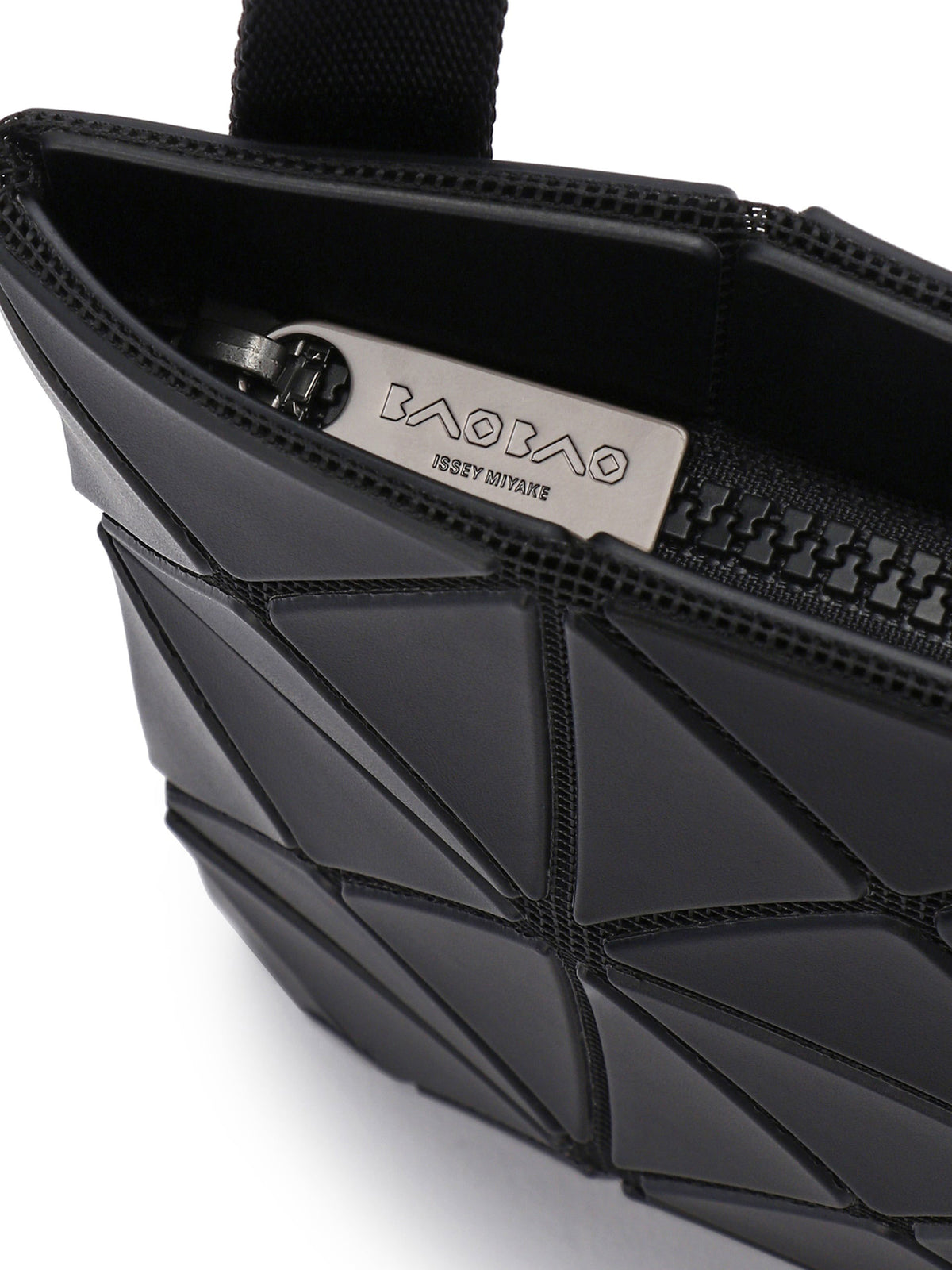 BAO BAO ISSEY MIYAKE Lucent Matte Shoulder Bag 3x5 in Matte Black shown from an angled close-up view, highlighting the folded geometric triangular panels and upper opening.