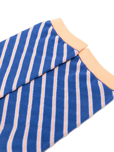Closeup of the top of Issey Miyake December AW25 Generic Stripes Socks in blue, highlighting ribbed cuff and striped pattern.