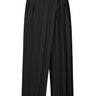 Black pants with wide pleats and a wrap style from Homme Plissé Issey Miyake on a white background