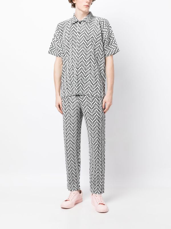 Homme Plissé Issey Miyake - straight pants in light grey and black square print - 2
