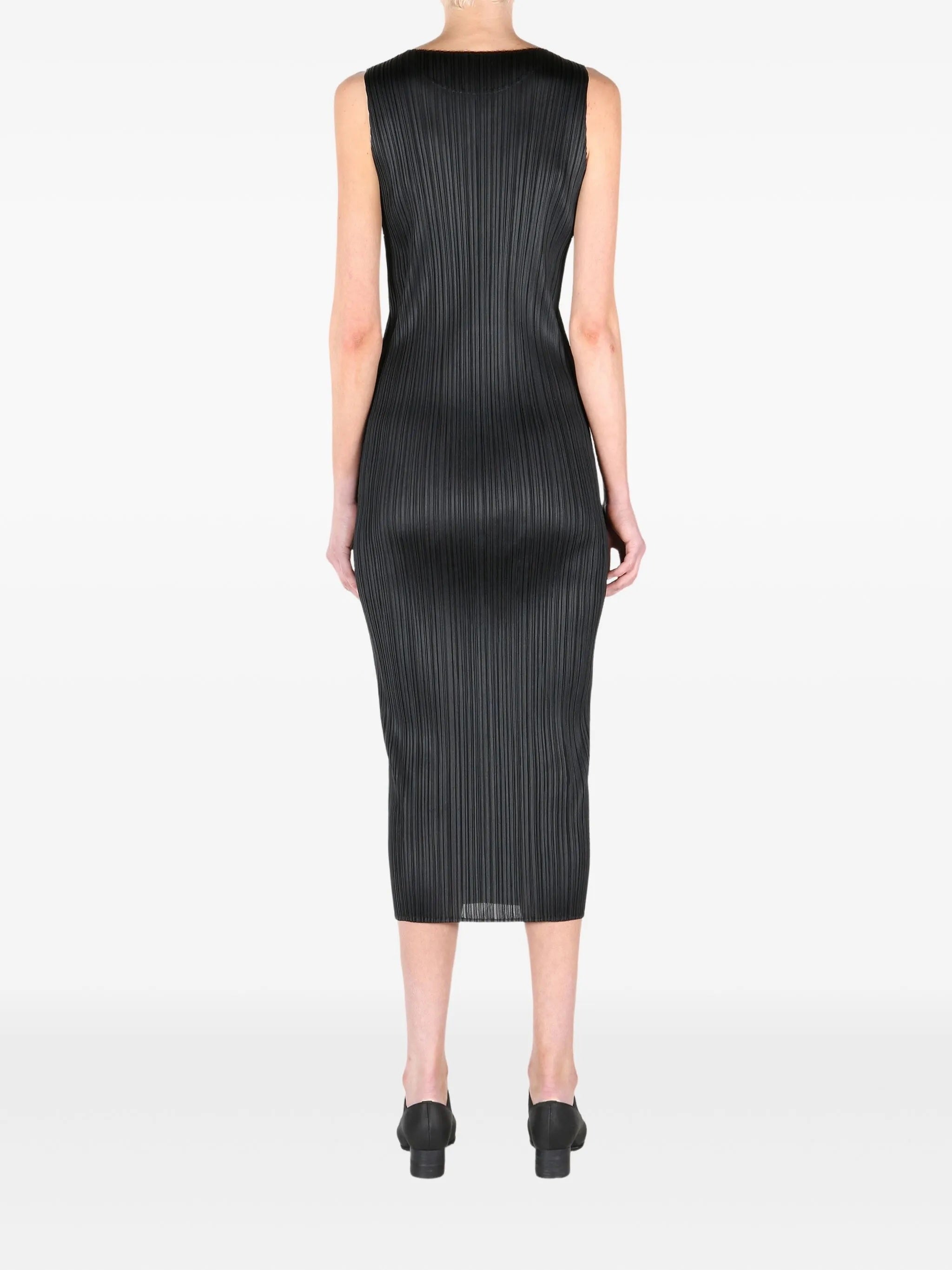 Black pleated sleeveless dress from Pleats Please Issey Miyake on a white background