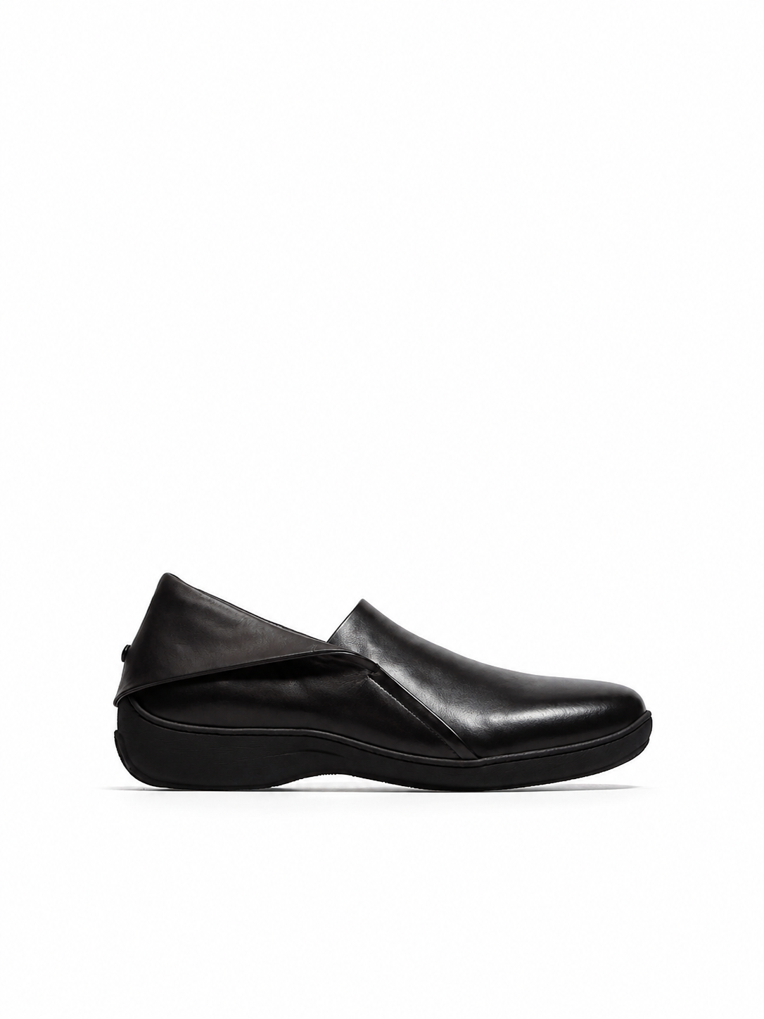 Kiko Kostadinov Iskar Slip-On Shoes in black leather with minimal rounded toe and sleek slip-on 
