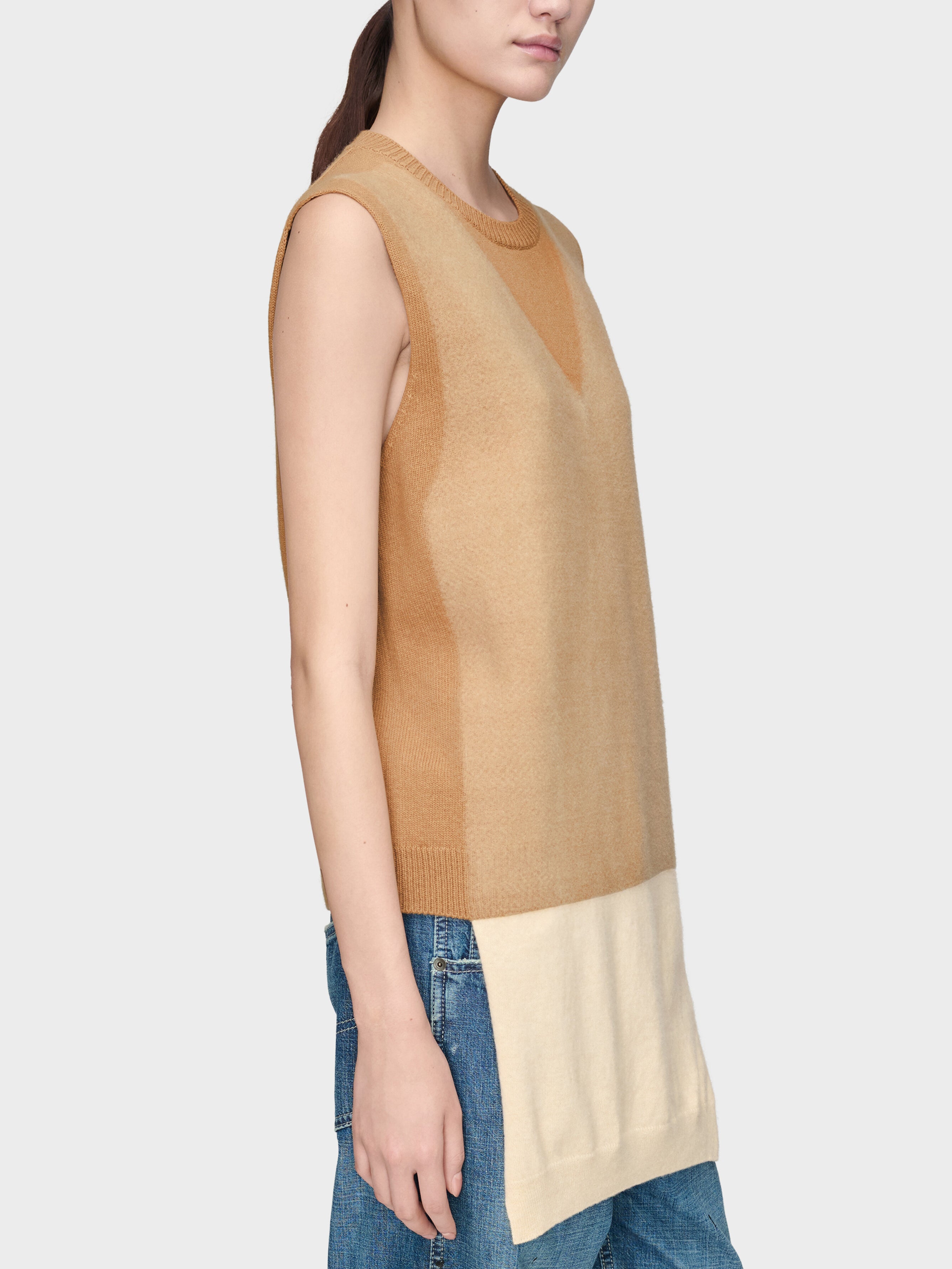 Side view of Maison Margiela Fuse Knit Top in camel and ecru virgin wool showing longline fit and sleeveless cut