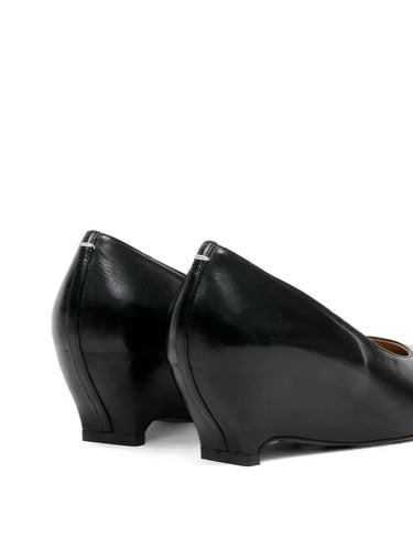 Maison Margiela Heel-Less Pump 55mm black, close rear angle highlighting the geometric wedge construction and Margiela stitch detail