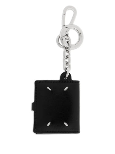 Back view of the Maison Margiela ID Photo Holder in black leather, featuring a clean exterior design with the brand’s four white signature stitches.