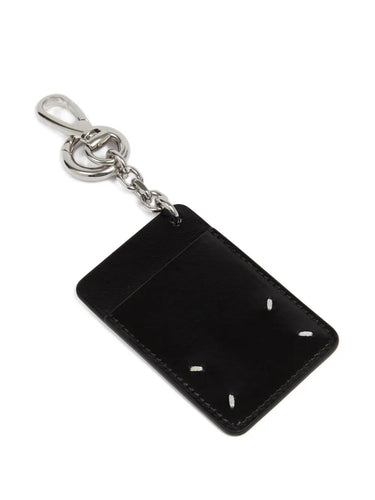 Back view of the black leather Maison Margiela Keyring Card, showing the signature four white stitches.