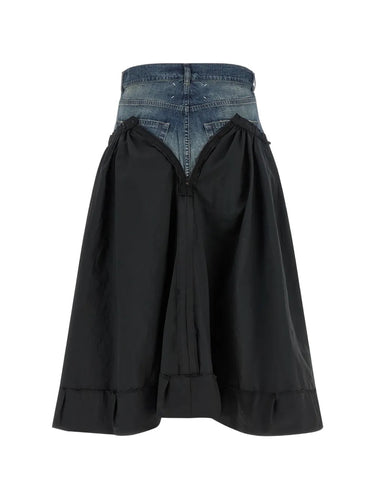 Back view of the black skirt with denim waistband from Maison Margiela on a white background